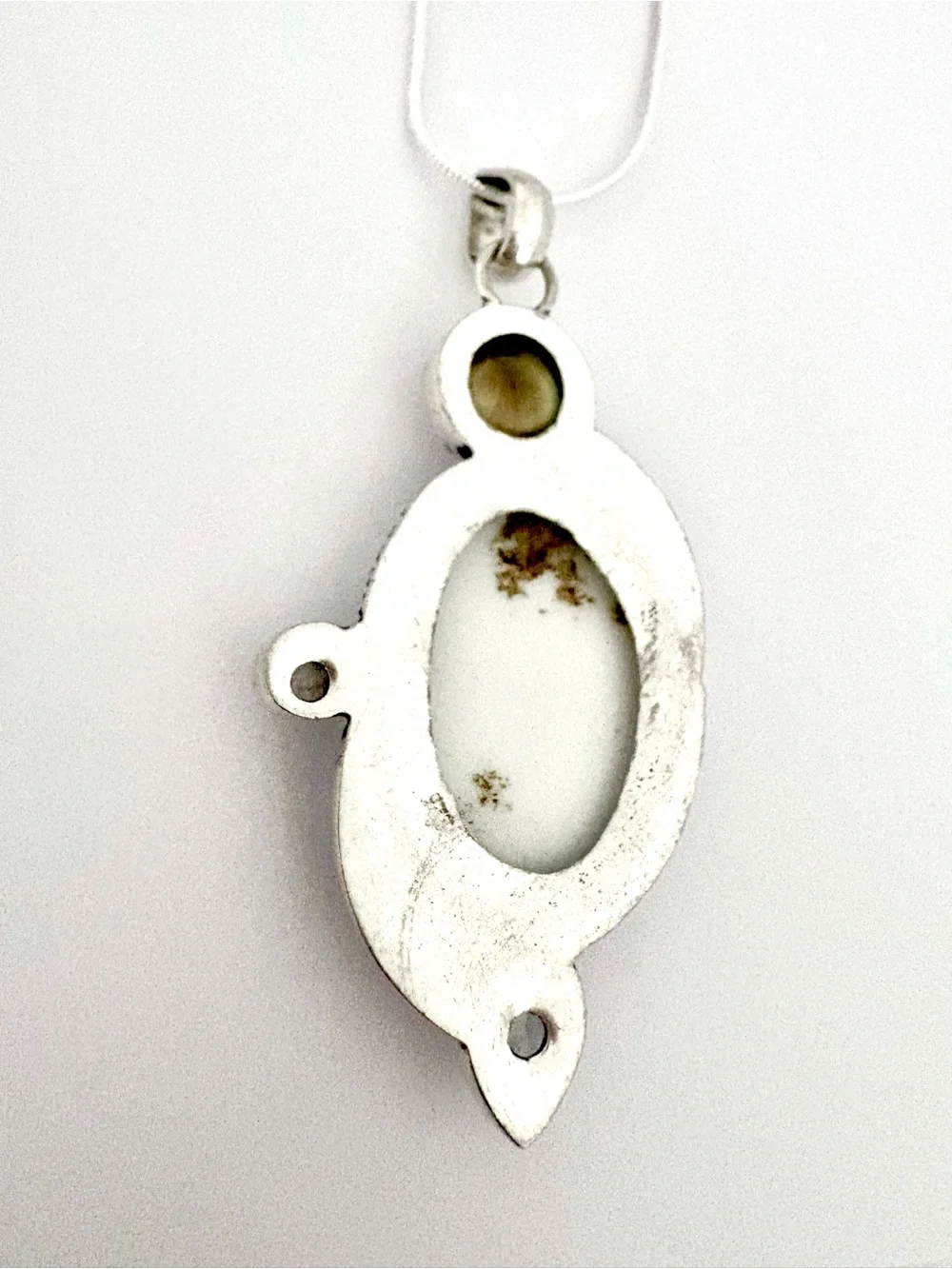 White Opal, Shiva Eye, Mystic Topaz and Moonstone pendant on silver chain.